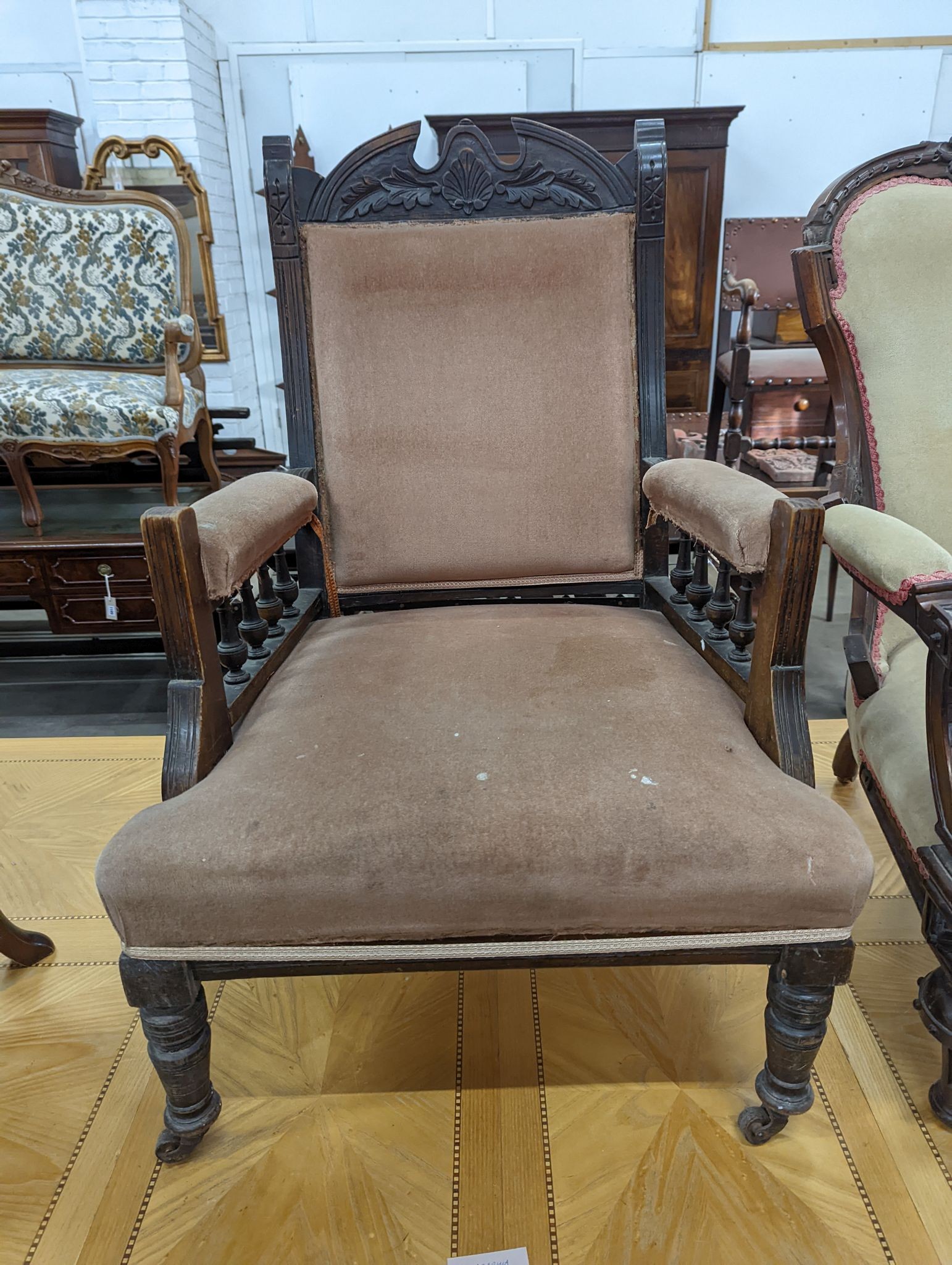 Two Victorian mahogany upholstered open armchairs